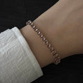 Pinkstone golden tennis bracelet